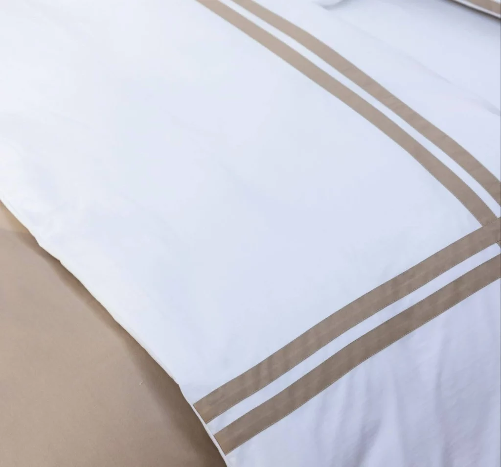 Luxury bed sheet with golden lines created for superyachts.